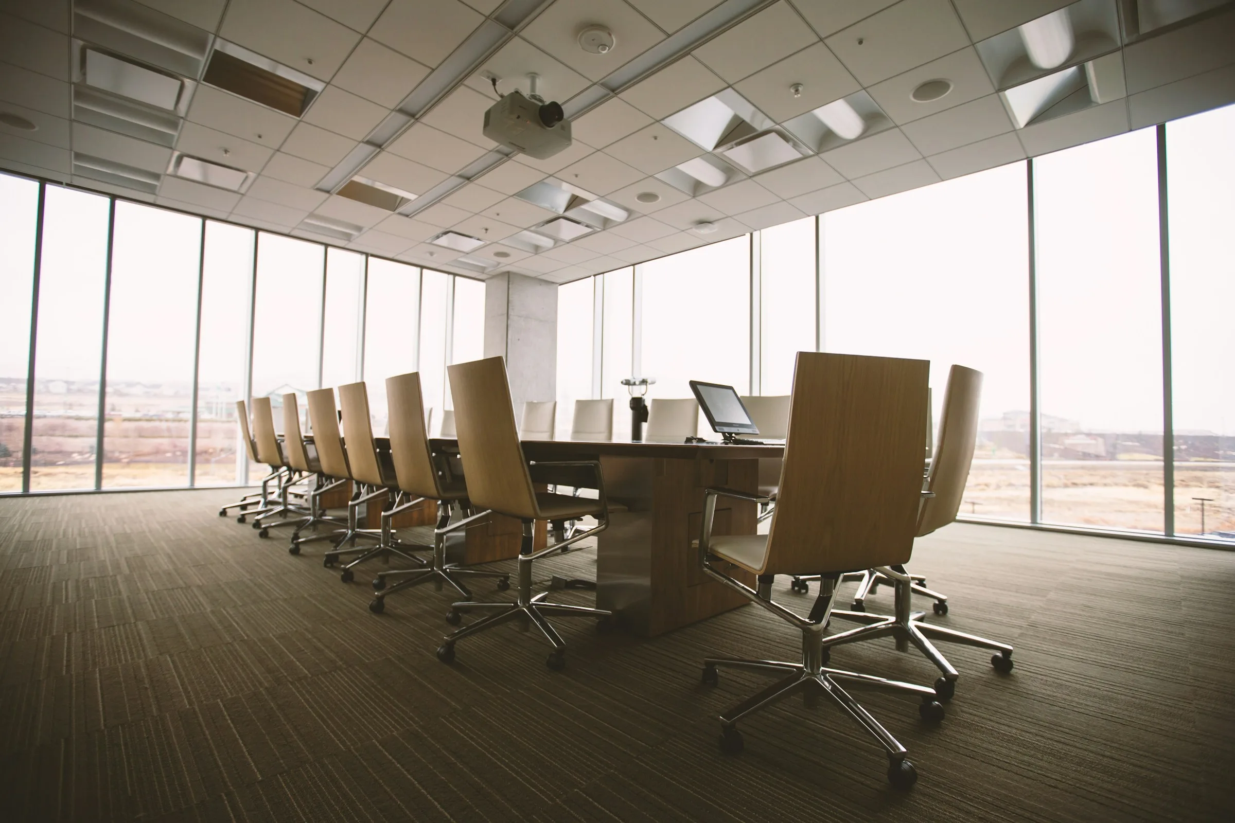 Meeting room with a long table and chairs
